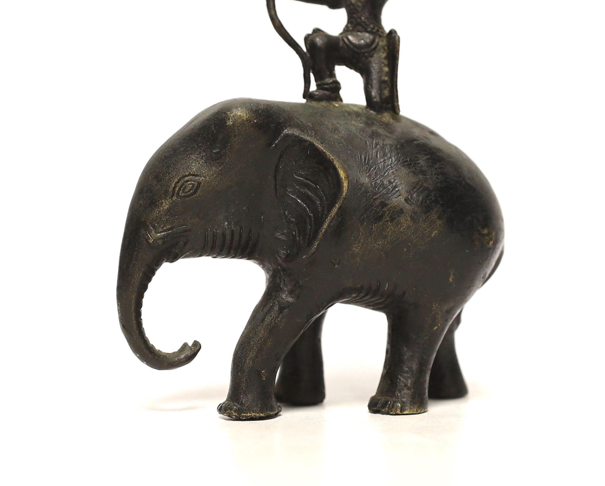 An Indian bronze elephant with mounted archer, 16cm high